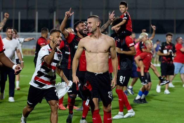 Jovan Cadjenovic (front) of Hamrun Spartans reacts in celebration with team mate Eder after his team™s triumph after the UEFA Champions League First qualifying round, 2nd leg soccer match between Hamrun Spartans FC and FK Zalgiris at the Centenary Stadium, in Ta Qali, Malta, 15 July 2025. Hamrun Spartans became the first Maltese soccer team to advance to the UEFA Champions League Second qualifying round. UEFA Champions League - Hamrun Spartans FC v FK Zalgiris