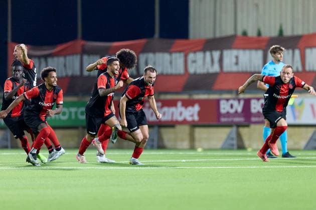 Hamrun Spartans players react in celebration after the decisive penalty scored by Jovan Cadjenovic (not in picture) during the penalty shoot out, after the UEFA Champions League First qualifying round, 2nd leg soccer match between Hamrun Spartans FC and FK Zalgiris at the Centenary Stadium, in Ta Qali, Malta, 15 July 2025. Hamrun Spartans became the first Maltese soccer team to advance to the UEFA Champions League Second qualifying round. UEFA Champions League - Hamrun Spartans FC v FK Zalgiris