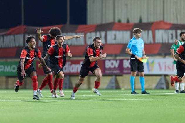 Hamrun Spartans players react in celebration after the decisive penalty scored by Jovan Cadjenovic (not in picture) during the penalty shoot out, after the UEFA Champions League First qualifying round, 2nd leg soccer match between Hamrun Spartans FC and FK Zalgiris at the Centenary Stadium, in Ta Qali, Malta, 15 July 2025. Hamrun Spartans became the first Maltese soccer team to advance to the UEFA Champions League Second qualifying round. UEFA Champions League - Hamrun Spartans FC v FK Zalgiris