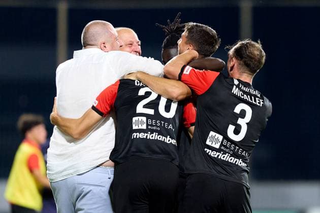 Jovan Cadjenovic (2nd left) of Hamrun Spartans reacts in celebration with team mates and staff members after the UEFA Champions League First qualifying round, 2nd leg soccer match between Hamrun Spartans FC and FK Zalgiris at the Centenary Stadium, in Ta Qali, Malta, 15 July 2025. Hamrun Spartans became the first Maltese soccer team to advance to the UEFA Champions League Second qualifying round. UEFA Champions League - Hamrun Spartans FC v FK Zalgiris
