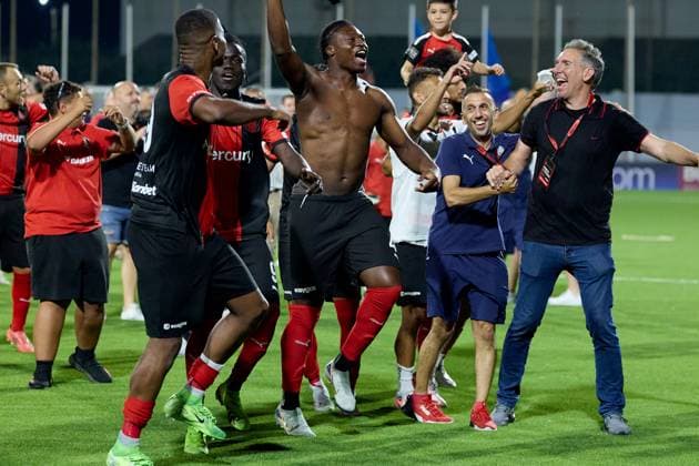Hamrun Spartans players and technical staff member react in celebration after their team™s triumph in the UEFA Champions League First qualifying round, 2nd leg soccer match between Hamrun Spartans FC and FK Zalgiris at the Centenary Stadium, in Ta Qali, Malta, 15 July 2025. Hamrun Spartans became the first Maltese soccer team to advance to the UEFA Champions League Second qualifying round. UEFA Champions League - Hamrun Spartans FC v FK Zalgiris