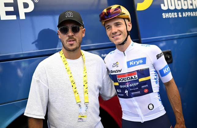 Belgian Remco Evenepoel of Soudal Quick-Step and Eden Hazard pictured at the start of stage 11 of the 2025 Tour de France cycling, from and to Toulouse (154km), on Wednesday 16 July 2025 in France. The 112th edition of the Tour de France starts on Saturday 5 July in Lille, France, and will finish in Paris, France on the 27th of July. JASPERxJACOBS  x129370203x