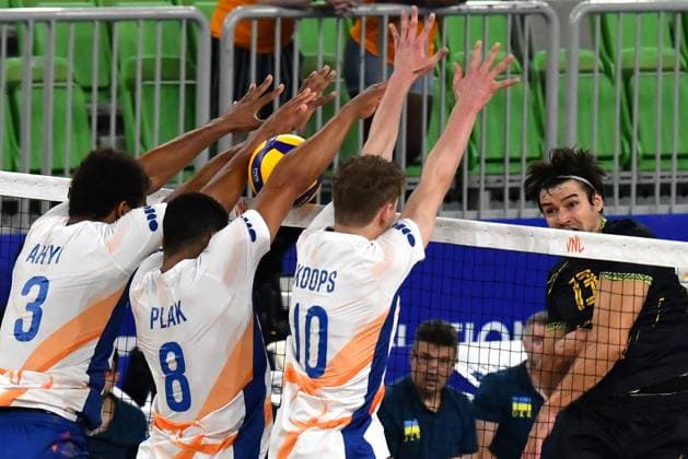 Ljubljana, Slovenia, 16th July 2024: Vasyl Tupchii of Ukraine (R) in action against Fabian Plak of Netherlands (C) during the IVNL Volleyball Nations League, Week 3 match, between Ukraine and Netherlands at Arena Stozice, Ljubljana, Slovenia. (Natasa Kupljenik SPP) Copyright: xNatasaxKupljenikx xSPPx SPP_1015266