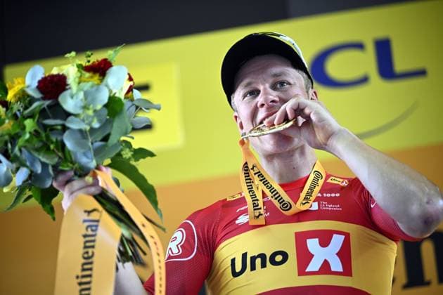Norwegian Jonas Abrahamsen of Uno-X Mobility celebrates on the podium after winning stage 11 of the 2025 Tour de France cycling, from and to Toulouse (154km), on Wednesday 16 July 2025 in France. The 112th edition of the Tour de France starts on Saturday 5 July in Lille, France, and will finish in Paris, France on the 27th of July. JASPERxJACOBS  x129381624x