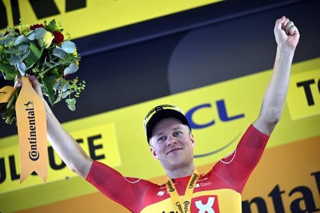 Norwegian Jonas Abrahamsen of Uno-X Mobility celebrates on the podium after winning stage 11 of the 2025 Tour de France cycling, from and to Toulouse (154km), on Wednesday 16 July 2025 in France. The 112th edition of the Tour de France starts on Saturday 5 July in Lille, France, and will finish in Paris, France on the 27th of July. JASPERxJACOBS  x129381726x