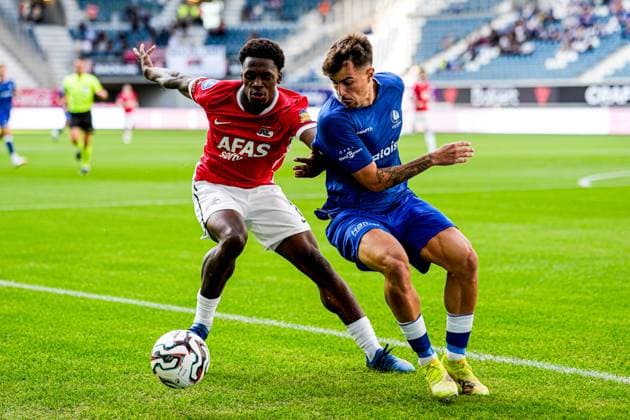 2025-07-16 KAA Gent v AZ Alkmaar - Pre-Season Friendly GENT, NETHERLANDS - JULY 16: Ernest Poku of AZ Alkmaar, Tiago Araujo of KAA Gent battle for the ball during the Pre-Season Friendly match between KAA Gent and AZ Alkmaar at Planet Group arena on July 16, 2025 in Gent, Netherlands. Gent Planet Group arena Netherlands Content not available for redistribution in The Netherlands directly or indirectly through any third parties. Copyright: xEdxvanxdexPolx