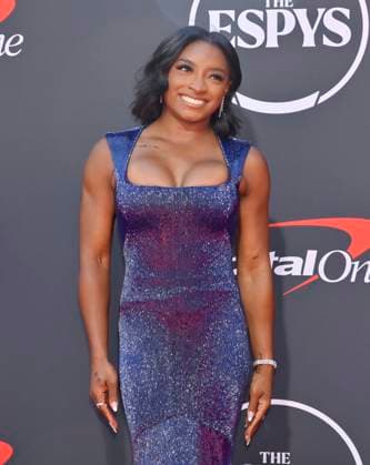 Simone Biles attends the annual ESPY Awards at the Dolby Theatre in the Hollywood section of Los Angeles on Wednesday, July 16, 2025. The annual event honors the top athletes and performances of the year.  LAP2025071627 JIMxRUYMEN