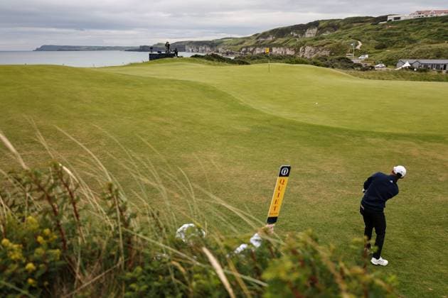 The 153rd Open Championship, Royal Portrush Golf Club, Co. Antrim 17 7 2025 Collin Morikawa chips onto the 5th green Collin Morikawa chips onto the 5th green 17 7 2025  Copyright: x INPHO BenxBradyx 0G8A8826