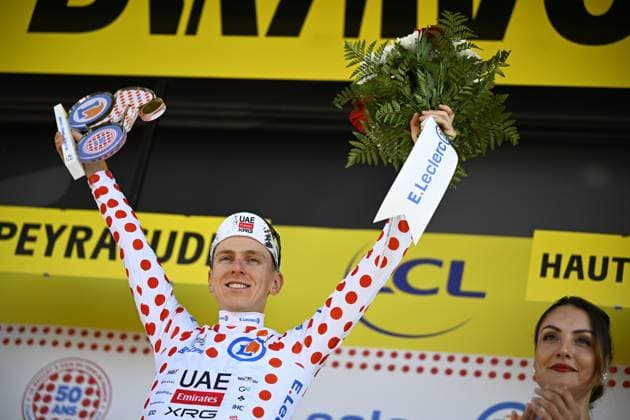 Slovenian Tadej Pogacar of UAE Team Emirates celebrates on the podium in the red polka-dot jersey for best climber after stage 13 of the 2025 Tour de France cycling race, an 11km individual time trial from Loudenvielle to Peyragudes, on Friday 18 July 2025 in France. The 112th edition of the Tour de France starts on Saturday 5 July in Lille, France, and will finish in Paris, France on the 27th of July. JASPERxJACOBS  x129502237x