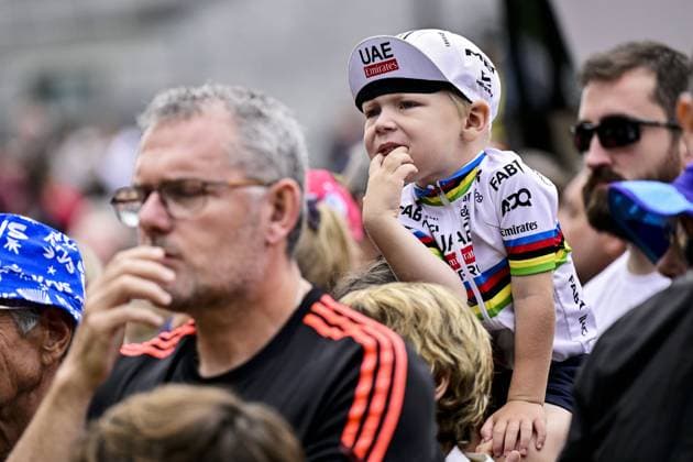 A young fan of and Slovenian Tadej Pogacar of UAE Team Emirates pictured at the start of stage 14 of the 2025 Tour de France cycling race, from Pau to Luchon-Superbagneres (183 km), on Saturday 19 July 2025 in France. The 112th edition of the Tour de France starts on Saturday 5 July in Lille, France, and will finish in Paris, France on the 27th of July. DIRKxWAEM  x129555753x