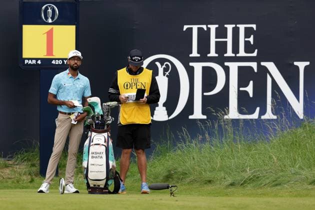 19th July 2025; Royal Portrush Golf Club, Portrush, County Antrim, Northern Ireland; The Open Golf Championship Round 3; Akshay Bhatia (USA) consults his caddie on the 1st tee  ActionPlus12815329 DavidxBlunsden
