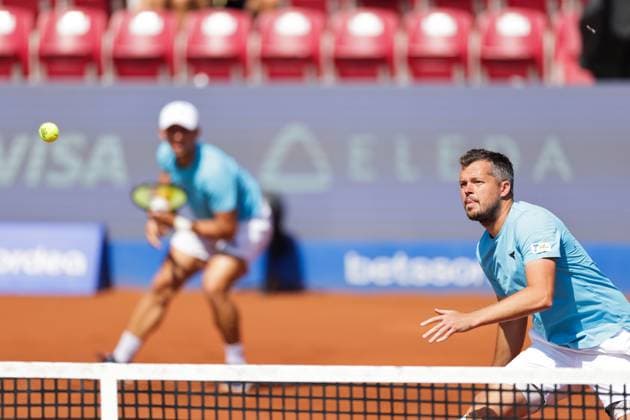Adam Pavlasek, Czech Republic, (in focus) and Jan Zielinski, Poland, (left) during Sunday s men s doubles final where they face Guido Andreozzi, Argentina, and Sander Arends, Netherlands, during the Nordea Open tennis tournament in Bastad, Sweden on the 20th of July 2025. BASTAD SWEDEN x9200x