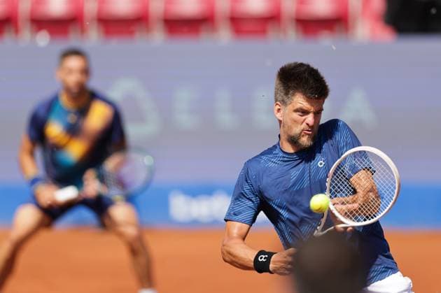 Sander Arends, Netherlands, (in focus) and Guido Andreozzi, Argentina, (left) during Sunday s men s doubles final where they face Adam Pavlasek, Czech Republic, and Jan Zielinski, Poland, during the Nordea Open tennis tournament in Bastad, Sweden on the 20th of July 2025. BASTAD SWEDEN x9200x