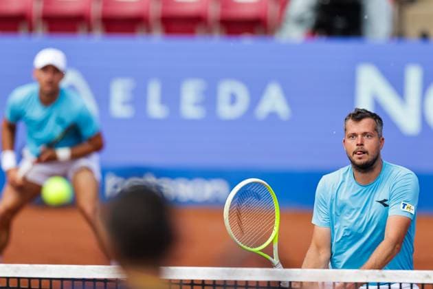 Adam Pavlasek, Czech Republic, (in focus) and Jan Zielinski, Poland, (left) during Sunday s men s doubles final where they face Guido Andreozzi, Argentina, and Sander Arends, Netherlands, during the Nordea Open tennis tournament in Bastad, Sweden on the 20th of July 2025. BASTAD SWEDEN x9200x