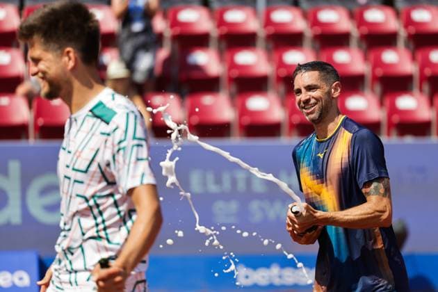 Sander Arends, Netherlands, (left) and Guido Andreozzi, Argentina, (right) celebrate the win of the men s doubles final on Sunday where they faced Adam Pavlasek, Czech Republic, and Jan Zielinski, Poland, during the Nordea Open tennis tournament in Bastad, Sweden on the 20th of July 2025. BASTAD SWEDEN x9200x