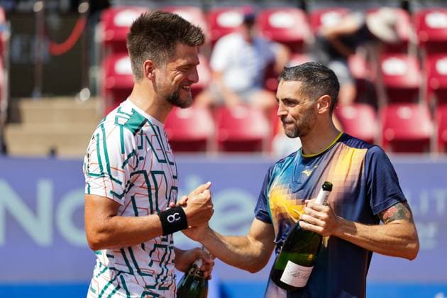 Sander Arends, Netherlands, (left) and Guido Andreozzi, Argentina, (right) celebrate the win of the men s doubles final on Sunday where they faced Adam Pavlasek, Czech Republic, and Jan Zielinski, Poland, during the Nordea Open tennis tournament in Bastad, Sweden on the 20th of July 2025. BASTAD SWEDEN x9200x