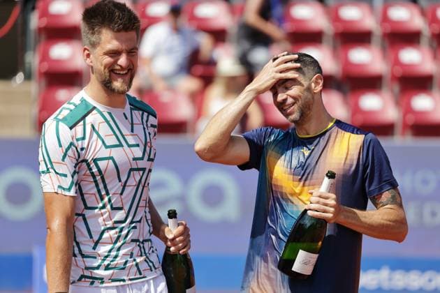Sander Arends, Netherlands, (left) and Guido Andreozzi, Argentina, (right) celebrate the win of the men s doubles final on Sunday where they faced Adam Pavlasek, Czech Republic, and Jan Zielinski, Poland, during the Nordea Open tennis tournament in Bastad, Sweden on the 20th of July 2025. BASTAD SWEDEN x9200x