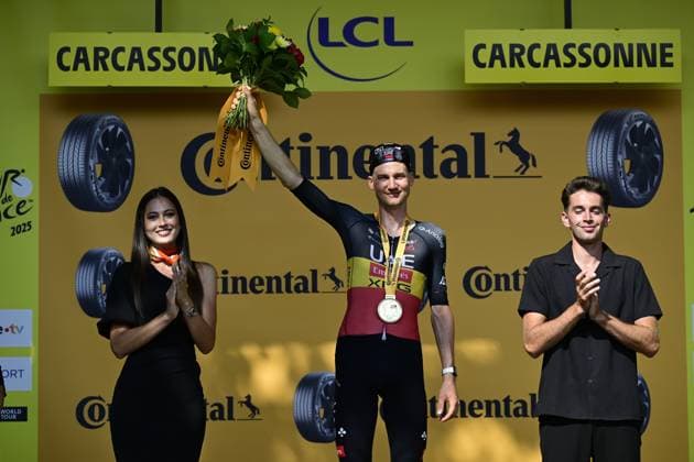 Belgian Tim Wellens of UAE Team Emirates and pictured on the podium after winning the stage 15 of the 2025 Tour de France cycling race, from Muret to Carcasonne (169 km), on Sunday 20 July 2025 in France. The 112th edition of the Tour de France starts on Saturday 5 July in Lille, France, and will finish in Paris, France on the 27th of July. DIRKxWAEM  x129659493x