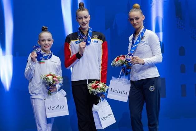 ALTRO - Ginnastica - Rhythmic gymnastics, Rhythmische Sportgymnastik, RSG - FIG World Cup Final Varfolomeev Darja (Ger) 1st place, Nikolova Stiliana (Bul) 2nd place and Dragas Tara (Ita) 3th place during the Ball Final of FIG Rhythmic Gymnastics World Cup, at Unipol Forum, Milan (Italy) on 20 July, 2025 during Rhythmic Gymnastics - FIG World Cup Final, Gymnastics in Milan, Italy, July 20 2025 Milan Italy  Copyright: xIPAxSport ABACAx