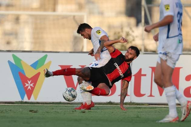 Vladyslav Dubinchak (left) of Dynamo Kyiv is in action against Rafael Compri of Hamrun Spartans during the UEFA Champions League Second qualifying round, 1st leg soccer match between Hamrun Spartans FC and FC Dynamo Kyiv at the Tony Bezzina Stadium, in Paola, Malta, on 22 July 2025. (Photo: Domenic Aquilina) UEFA Champions League - Hamrun Spartans FC v FC Dynamo Kyev