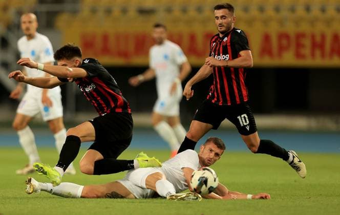 22.07.2025 Skopje KF Shkendija Tetovo-FCSB champion s league qualifiers second leg men s football Florin Tanase(down) FCSB between Reshat Ramadani (L), Endrit Krasniqi(R) Shkendija :