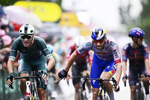 Italian Jonathan Milan of Lidl-Trek and Belgian Jordi Meeus of RedBull-BORA-hansgrohe cross the finish line of stage 17 of the 2025 Tour de France cycling race, from Bollene to Valence (161km), on Wednesday 23 July 2025 in France. The 112th edition of the Tour de France starts on Saturday 5 July in Lille, France, and will finish in Paris, France on the 27th of July. DIRKxWAEM  x129864251x