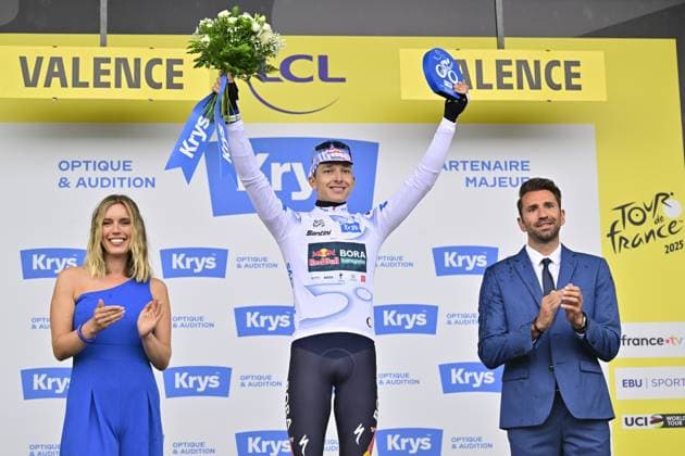 German Florian Lipowitz of RedBull-BORA-hansgrohe celebrates on the podium in the white jersey for best young rider after stage 17 of the 2025 Tour de France cycling race, from Bollene to Valence (161km), on Wednesday 23 July 2025 in France. The 112th edition of the Tour de France starts on Saturday 5 July in Lille, France, and will finish in Paris, France on the 27th of July. DIRKxWAEM  x129865726x