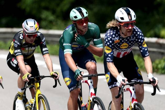 Belgian Wout van Aert of Team Visma-Lease a Bike, Italian Jonathan Milan of Lidl-Trek and US Quinn Simmons of Lidl-Trek pictured in action during stage 18 of the 2025 Tour de France cycling race, from Vif to Courchevel Col de la Loze, on Thursday 24 July 2025 in France. The 112th edition of the Tour de France starts on Saturday 5 July in Lille, France, and will finish in Paris, France on the 27th of July. POOLxLUCAxBETTINI  x129915871x
