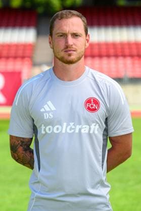 23.07.2025 - 1. FC Nürnberg FCN ( Club ) - 2. Fussball Bundesliga BL - Saison 2025 2026 - Fototermin Porträttermin Vorstellung Präsentation Pressetermin - - Einzelbild Einzelfoto Portrait Porträt Kopfbild - Dominik Schmitt (Übergangstrainer 1. FC Nürnberg FCN )