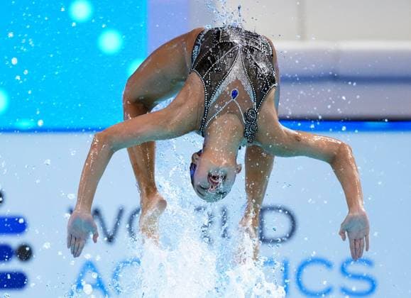 (250725) -- SINGAPORE, July 25, 2025 -- Kantinan Adisaisiributr Supitchaya Songpan of Thailand compete during the mixed duet free final of artistic swimming at the World Aquatics Championships in Singapore, July 25, 2025. ) (SP)SINGAPORE-WORLD AQUATICS CHAMPIONSHIPS-ARTISTIC SWIMMING-MIXED DUET FREE LuoxYuan 