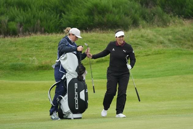25th July 2025; Dundonald Links, Irvine, Scotland ISPS HANDA Womens Scottish Open Golf Round 2; Kelsey MacDonald hands her wedge to her caddie after her approach shot lands on the green  AlecxBrown