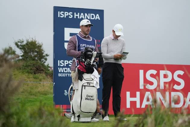 25th July 2025; Dundonald Links, Irvine, Scotland ISPS HANDA Womens Scottish Open Golf Round 2; Dewi Weber talks with her caddie before the shot on the 5th tee  AlecxBrown
