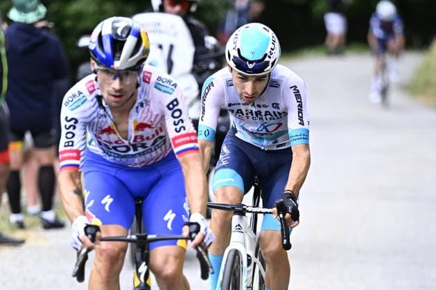 Slovenian Primoz Roglic of RedBull-BORA-hansgrohe and French Lenny Martinez of Bahrain Victorious pictured in action during stage 19 of the 2025 Tour de France cycling race, from Albertville to La Plagne (130km), on Friday 25 July 2025 in France. The 112th edition of the Tour de France starts on Saturday 5 July in Lille, France, and will finish in Paris, France on the 27th of July. JASPERxJACOBS  x129997502x