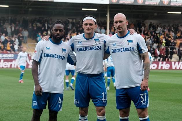 UK: Motherwell v Hertha BSC, Friendly at Fir Park Stadium, Motherwell, Scotland on 25 July 2025: Pictured: Deyovaisio Zeefuik (Hertha BSC), Fabian Reese (Hertha BSC) and Toni Leistner (Hertha BSC) before the match Motherwell Fir Park Stadium Scotland Copyright: xAlexxToddx