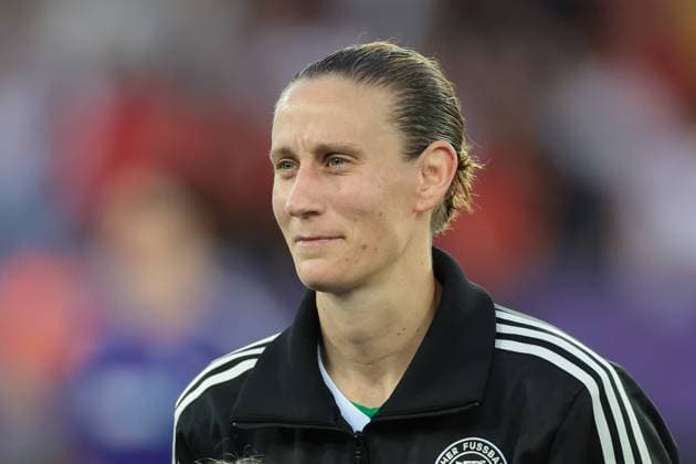Zurich, Switzerland, 23rd July 2025. Ann-Katrin Berger of Germany reacts as she looks on during the line up prior to kick off in the Germany Women vs Spain Women UEFA Women s Euro semi final match at Stadion Letzigrund, Zurich. Picture credit should read: Jonathan Moscrop Sportimage EDITORIAL USE ONLY. No use with unauthorised audio, video, data, fixture lists, club league logos or live services. Online in-match use limited to 120 images, no video emulation. No use in betting, games or single club league player publications. SPI_126_JM_GER_ESP_FEMM SPI-4028-0126