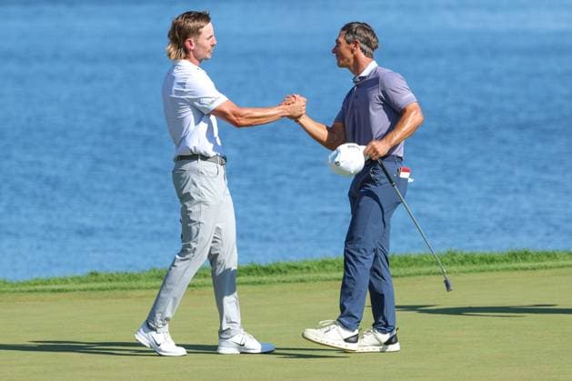 July 26th, 2025: ThorbjoÂ¸rn Oleson of Denmark and Jake Knapp of the United States shake hands after finishing the 18th during the third round of the 3M Open 2025 at TPC Twin Cities on July 26th, 2025 in Blaine, Minnesota. -CSM Blaine USA - ZUMAc04_ 20250726_zma_c04_205 Copyright: xStevenxGarciax