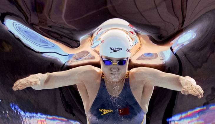 Sport Bilder des Tages (250727) -- SINGAPORE, July 27, 2025 -- Zhang Yufei of China competes during the women s 100m butterfly semifinal of swimming at the World Aquatics Championships in Singapore, July 27, 2025. ) (SP)SINGAPORE-WORLD AQUATICS CHAMPIONSHIPS-SWIMMING-WOMEN S 100M BUTTERFLY-SEMIFINAL XiaxYifang 