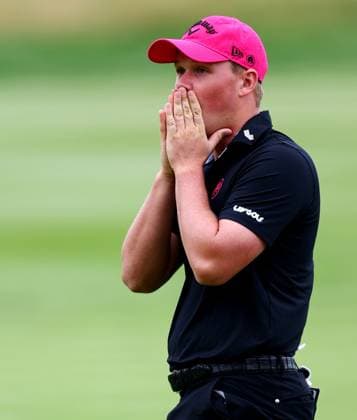 Caleb Surratt of USA reacts to a missed putt. LIV Golf UK, Day Three, Golf, JCB Golf & Country Club, Uttoxeter, UK - 27 Jul 2025Uttoxeter JCB Golf & Country Club United Kingdom EDITORIAL USE ONLY No use with unauthorised audio, video, data, fixture lists, club league logos or live services. Online in-match use limited to 120 images, no video emulation. No use in betting, games or single club league player publications. Copyright: xJamesxMarsh Shutterstockx 15410873at