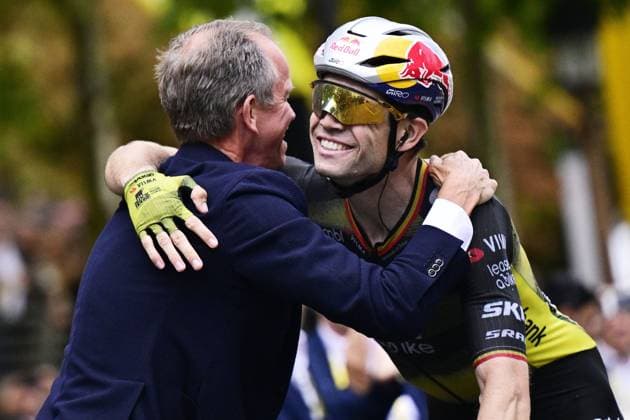 Belgian Wout van Aert of Team Visma-Lease a Bike celebrates with Team Visma-Lease a Bike general manager Richard Plugge as he crosses the finish line to win stage 21 of the 2025 Tour de France cycling race, from Mantes-la-Ville to Paris (120km), on Sunday 27 July 2025 in France. The 112th edition of the Tour de France starts on Saturday 5 July in Lille, France, and will finish in Paris, France on the 27th of July. DIRKxWAEM  x130129607x