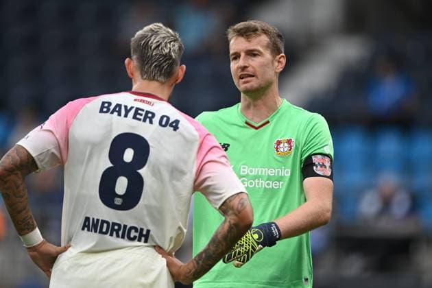 v.l. Robert ANDRICH (LEV) und Torwart Lukas HRADECKY (LEV) Fussball Testspiel, Saisoneroeffnung, VfL Bochum (BO) - Bayer Leverkusen (LEV) 0-2 am 27.07.2025, Vonovia Ruhrstadion Bochum Deutschland. DFL regulations prohibit any use of photographs as image sequences and or quasi-video Â