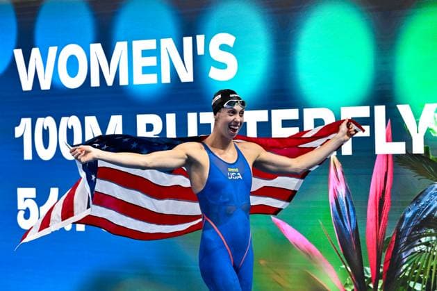 Gretchen Walsh of United States of America celebrates after winning the gold medal in the swimming 100m Butterfly Women Final during the 22nd World Aquatics Championships at the WAC Arena in Singapore (Singapore), July 28, 2025. Andrea Masini