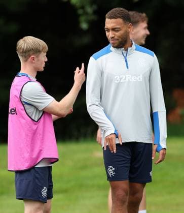 Lyall Cameron chats with Cyriel Dessers during training ahead of tomorrow s Champions League second leg qualifying match against Panathinaikos. Rangers Training - The Rangers Training Centre, Glasgow, Lanarkshire, Scotland, UK - 29 Jul 2025Glasgow The Rangers Training Centre Lanarkshire United Kingdom  Copyright: xO Rourke RangersxFC Shutterstockx 15419009bo
