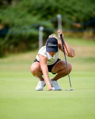 30th July 2025; Royal Porthcawl Golf Club, Porthcawl, Wales; AIG Womens Open Golf, Practice Day; Pauline Roussin& x2011;Bouchard lining up her putt  AledxHopkins