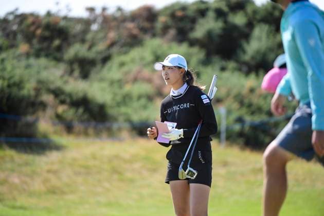 30th July 2025; Royal Porthcawl Golf Club, Porthcawl, Wales; AIG Womens Open Golf, Practice Day; Saki Baba of Japan checking her course book  AledxHopkins