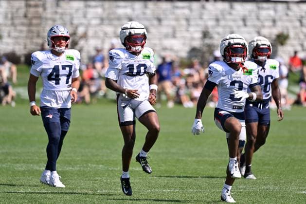 Jul 30, 2025; Foxborough, MA, USA; New England Patriots wide receiver Kyle Williams (18) warms up during training camp at Gillette Stadium, in Foxborough, Massachusetts. CSM Foxborough USA - ZUMAc04_ 20250730_zma_c04_038 Copyright: xEricxCanhax