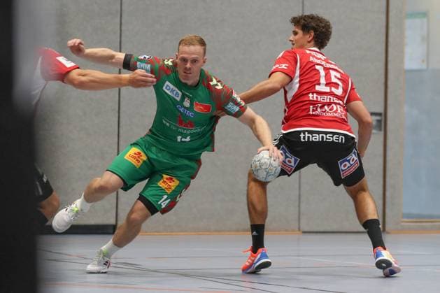 30.07.2025, xgox, Handball - Testspiel SC Magdeburg - Fredericia Handboldklub emspor, v.l. Omar Ingi Magnusson (Magdeburg, 14), Mad Kjeldgaard (Fredericia, 15) Zweikampf, Duell, Kampf, tackle Ilsenburg