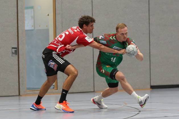 30.07.2025, xgox, Handball - Testspiel SC Magdeburg - Fredericia Handboldklub emspor, v.l. Mad Kjeldgaard (Fredericia, 15), Omar Ingi Magnusson (Magdeburg, 14) Zweikampf, Duell, Kampf, tackle Ilsenburg