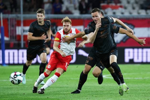 SOCCER - UEFA CL, RBS vs Brann SALZBURG,AUSTRIA,30.JUL.25 - SOCCER - UEFA Champions League, qualification, Red Bull Salzburg vs SK Brann Bergen. Image shows Yorbe Vertessen (RBS) and Joachim Soltvedt (Brann).  GEPAxpictures xDavidxGeieregger
