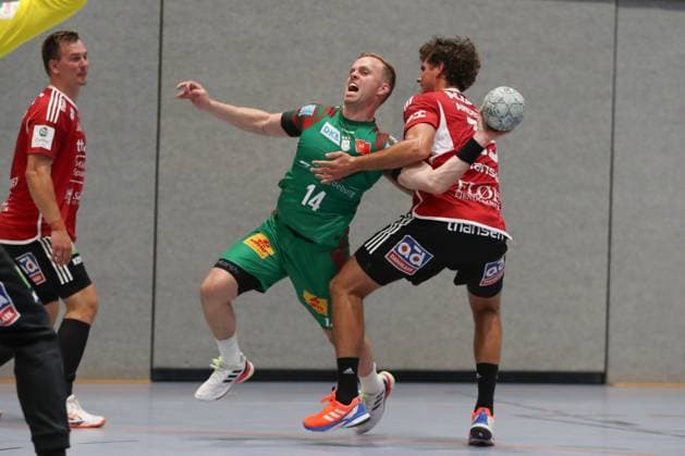 30.07.2025, xgox, Handball - Testspiel SC Magdeburg - Fredericia Handboldklub emspor, v.l. Omar Ingi Magnusson (Magdeburg, 14), Mads Kjeldgaard (Fredericia, 15) Zweikampf, Duell, Kampf, tackle Ilsenburg