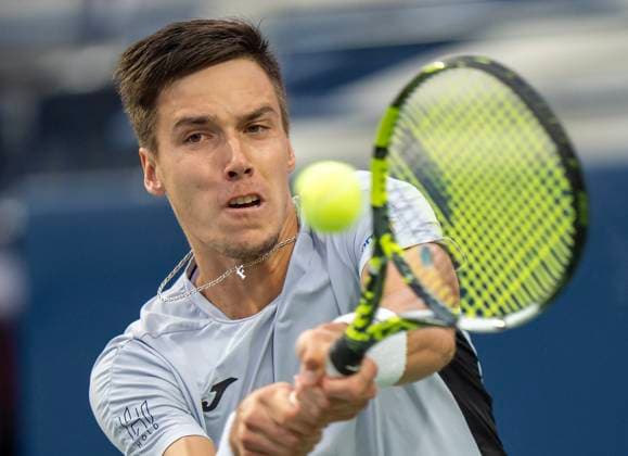 July 30, 2025, Toronto, On, Canada: Fabian Marozsan of Hungary hits a backhand return to Felix Auger-Aliassime of Canada during their match at the National Bank Open in Toronto on Wednesday July 30, 2025. Canada News - July 30, 2025  - ZUMAc35_ 20250730_zaf_c35_147 Copyright: xFrankxGunnx